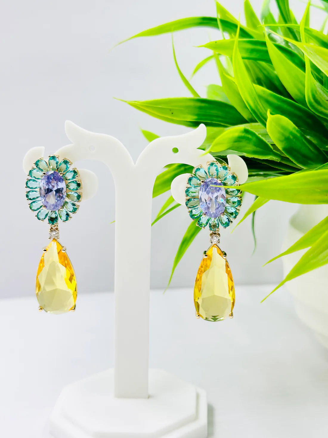 AESTHETIC GLASS STONE AND AD STUDDED EARRING