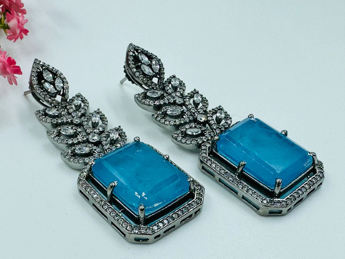 ELEGANT BLUE GLASS STONE ANS AD STUDDED EARRINGS