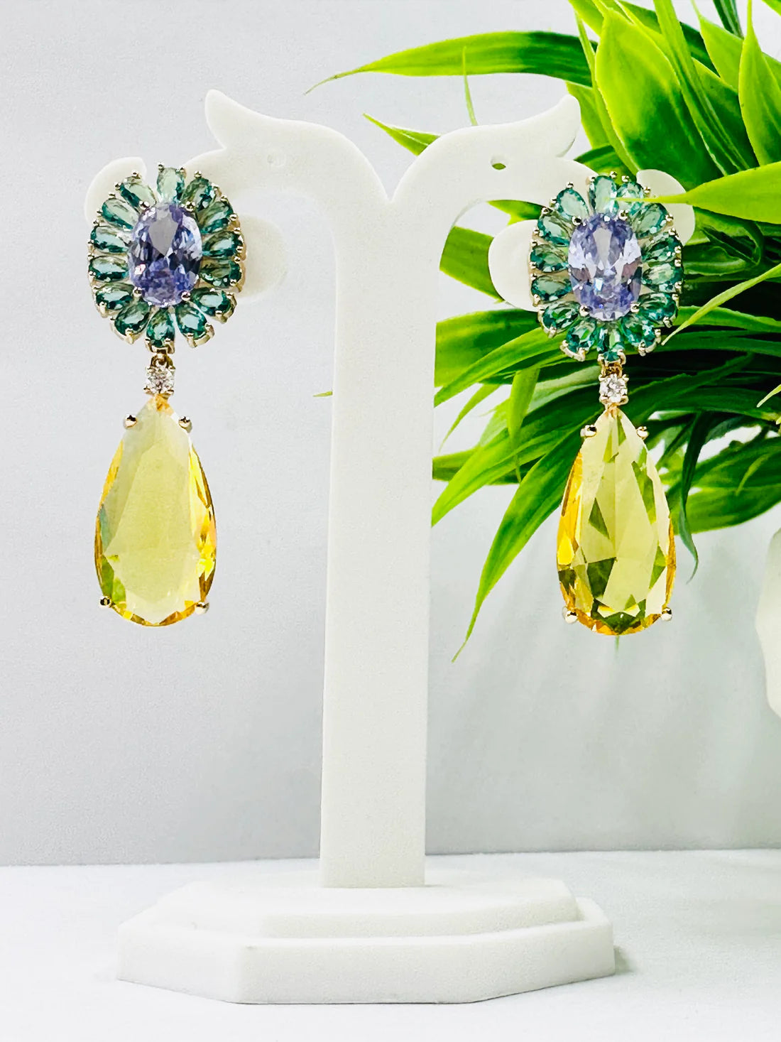 AESTHETIC GLASS STONE AND AD STUDDED EARRING