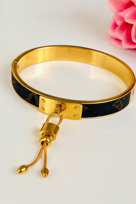 Gold-Plated Hinged Bangle for Women with Faux-Leather Inlay and Bolo Tassel, Hypoallergenic & Anti-Tarnish