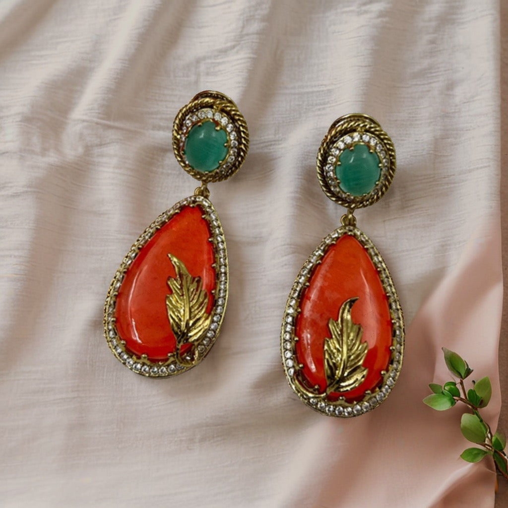 Arshiya Stand Out in the Crowd: Bold Orange and Green Statement Earrings!