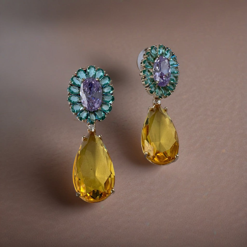 AESTHETIC GLASS STONE AND AD STUDDED EARRING