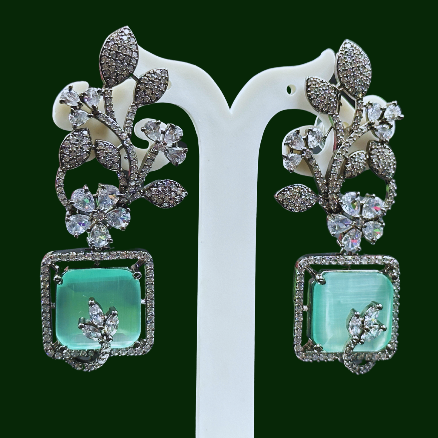 AESTHETIC GLASS STONE AND AD STUDDED EARRINGS