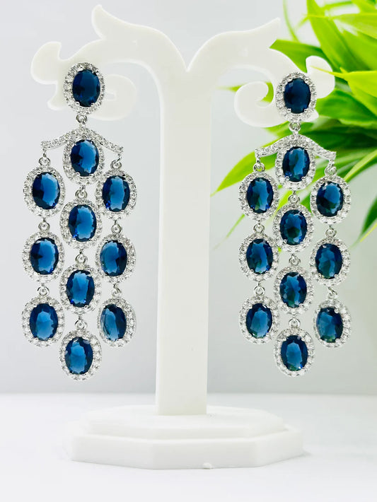 ELEGANT BLUE GLASS STONE AND AD STUDDED EARRINGS