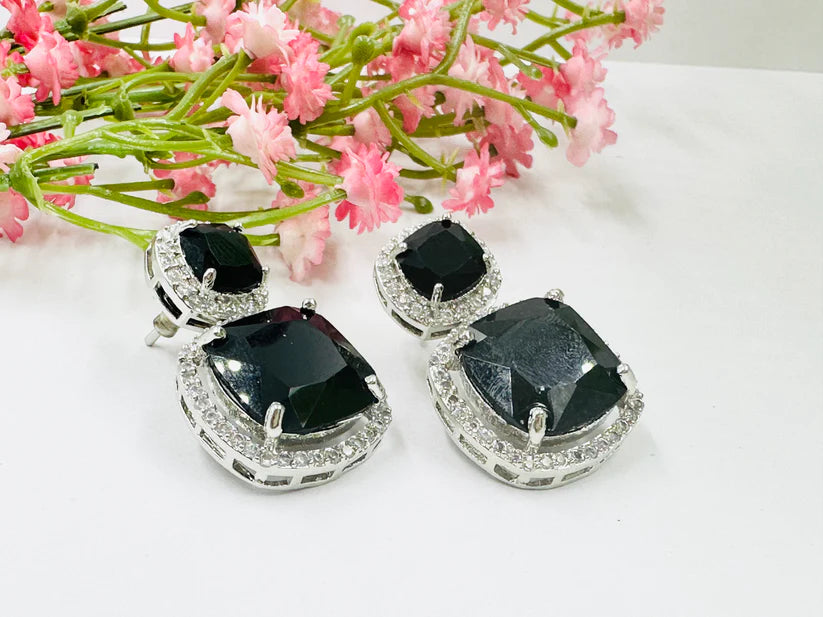 ELEGANT BLACK GLASS STONE AND AD STUDDED EARRING