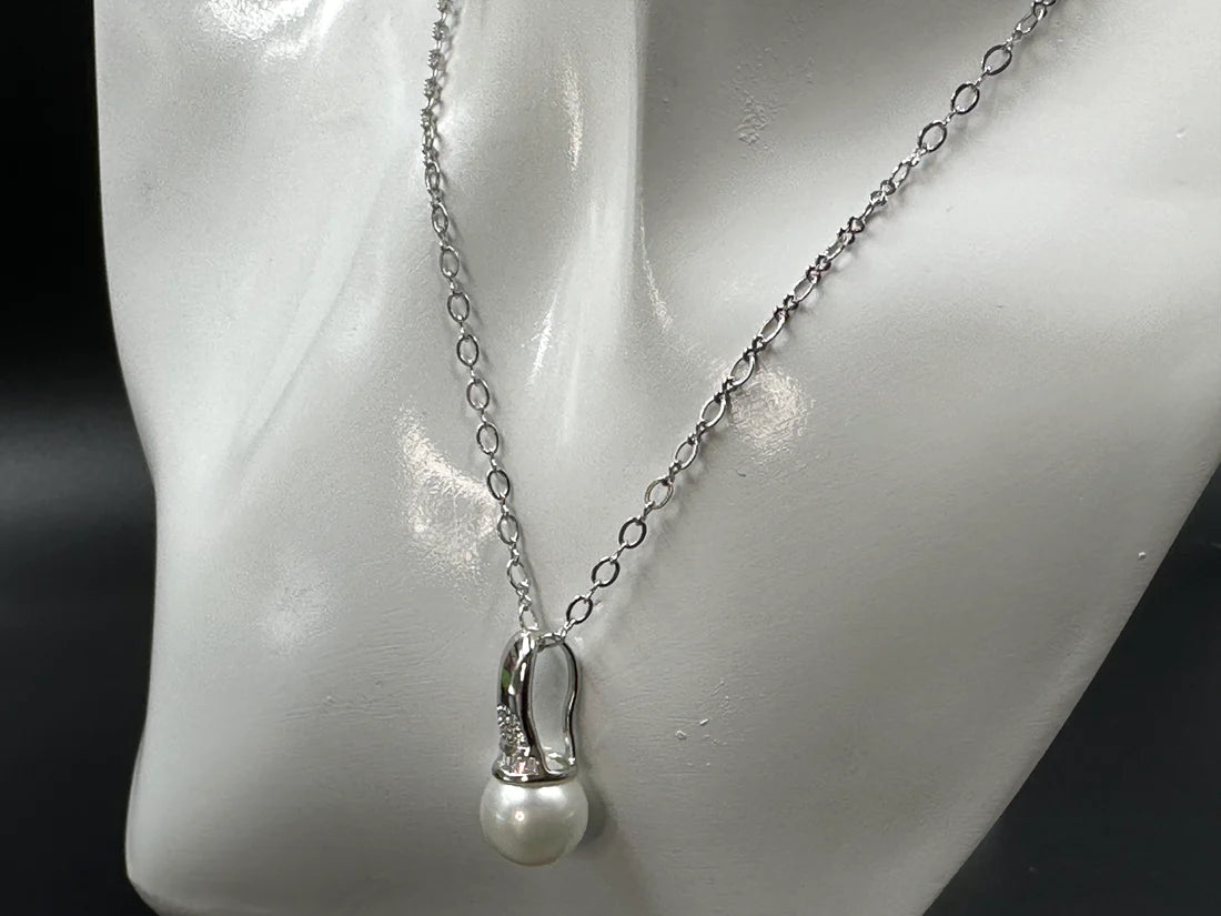 PEARL AND AD STUDDED PENDENT SET