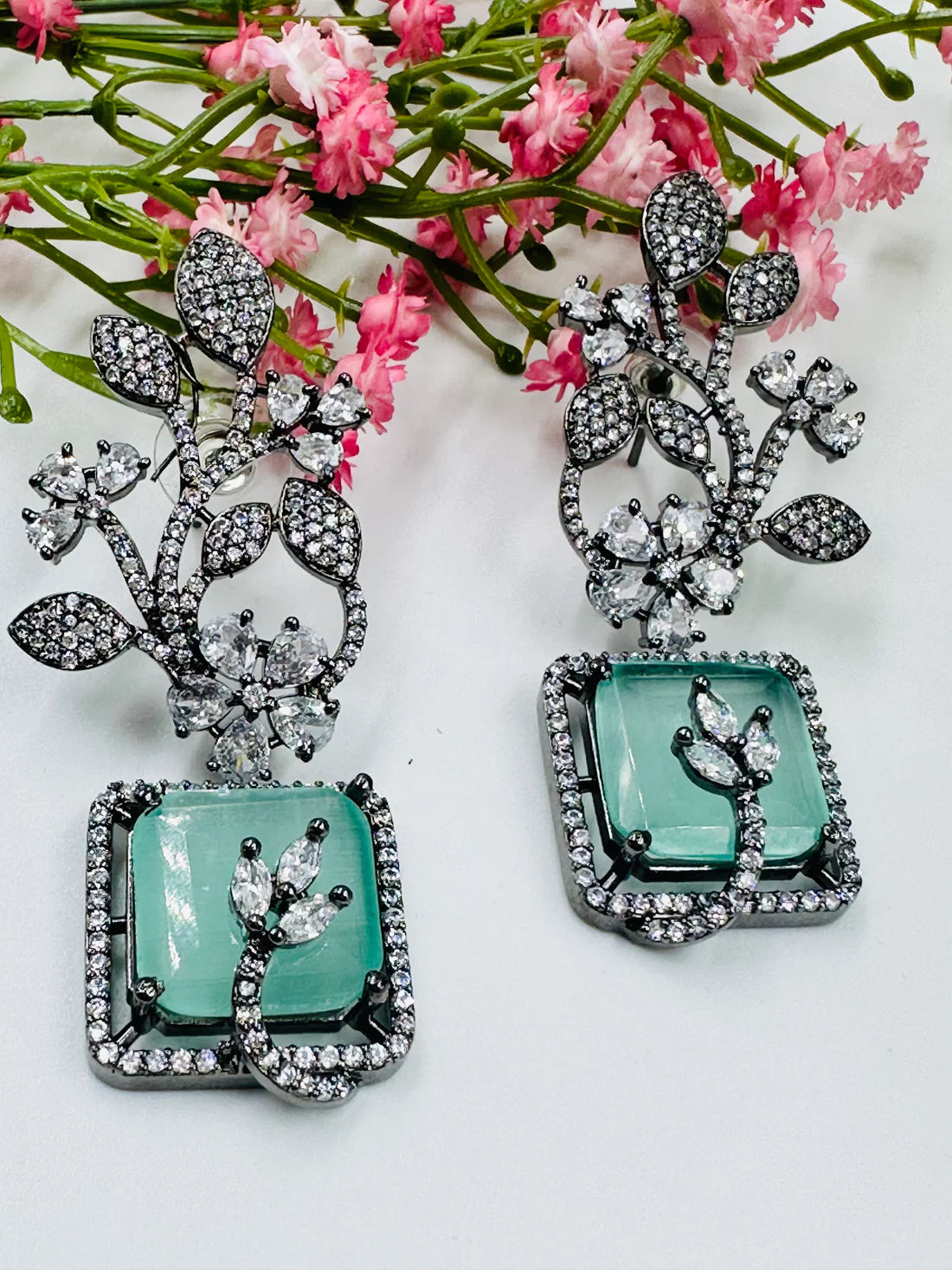 AESTHETIC GLASS STONE AND AD STUDDED EARRINGS