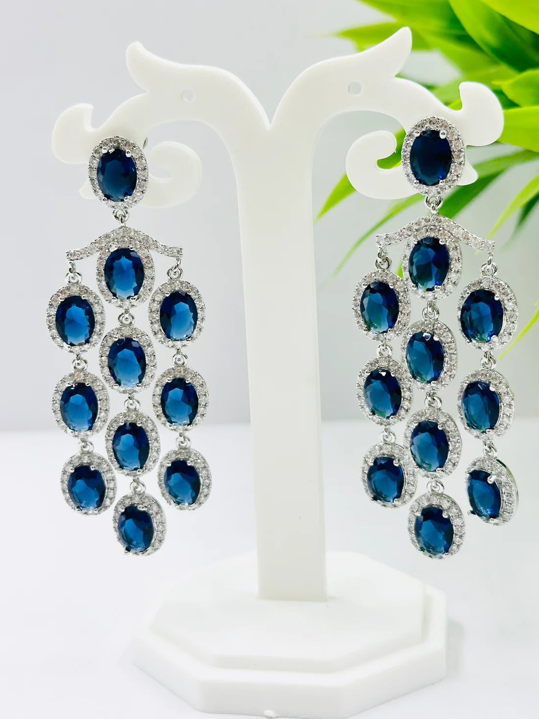 ELEGANT BLUE GLASS STONE AND AD STUDDED EARRINGS