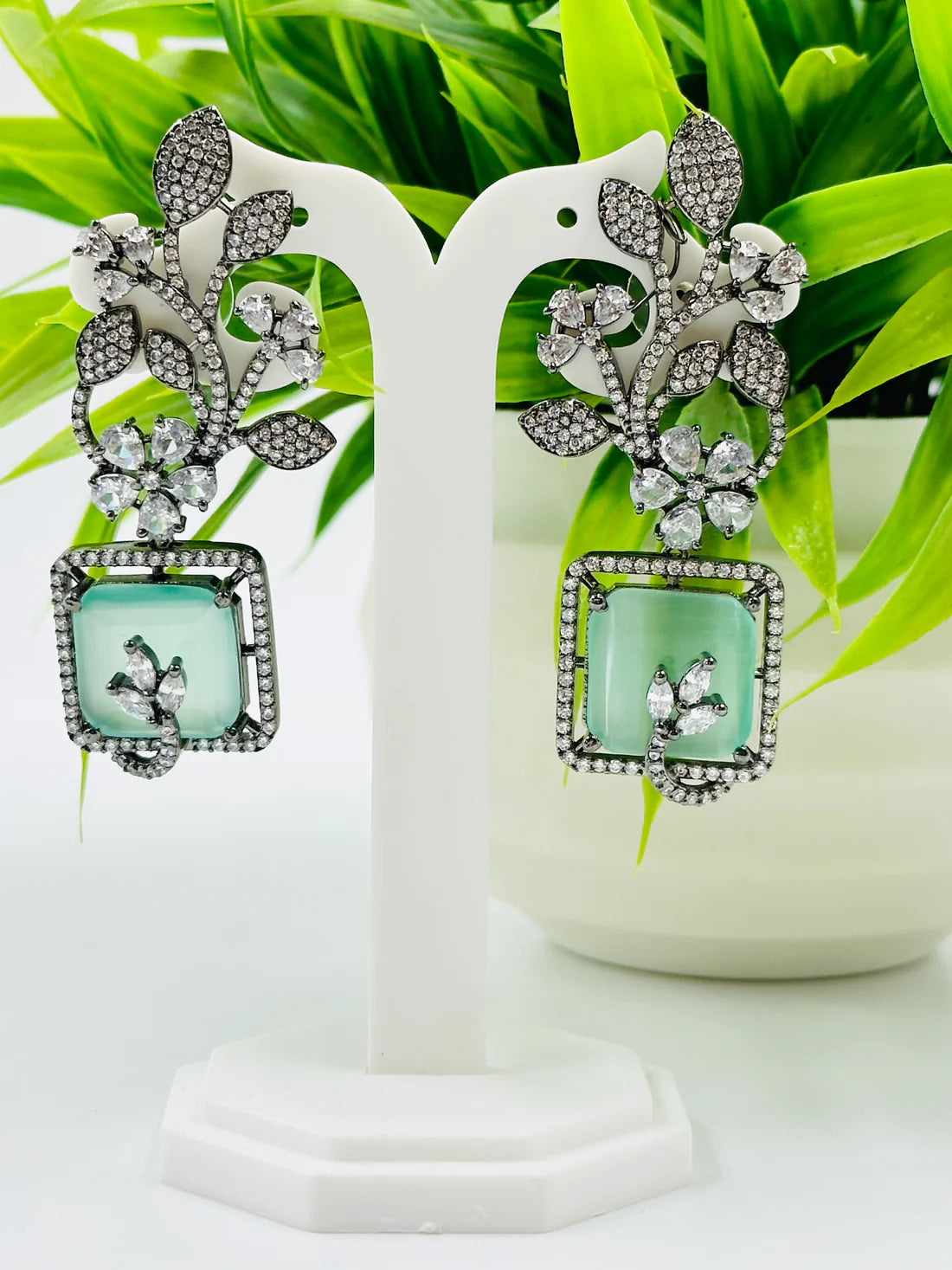 AESTHETIC GLASS STONE AND AD STUDDED EARRINGS