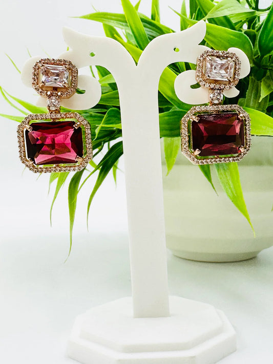 ELEGANT ROSE GOLD AND RUBY GLASS STONE STUDDED EARRING
