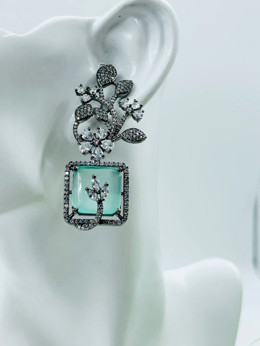 AESTHETIC GLASS STONE AND AD STUDDED EARRINGS