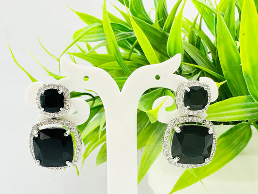 ELEGANT BLACK GLASS STONE AND AD STUDDED EARRING